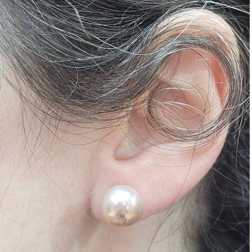 Boucles d'oreilles Boucles d’oreilles en or 18 carats et perles d’eau douce roses 58 Facettes TA128