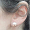 Boucles d'oreilles Boucles d’oreilles en or 18 carats et perles d’eau douce roses 58 Facettes TA128