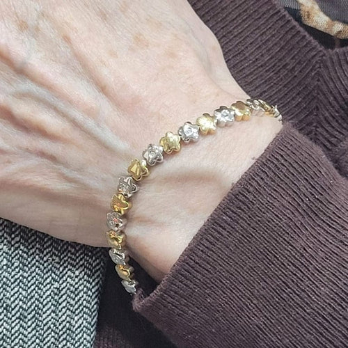 Bracelet Bracelet en or blanc et jaune 18 carats et diamants 58 Facettes P11
