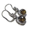 Boucles d'oreilles Boucles d'oreilles en or blanc 18 carats avec diamants et quartz fumé 58 Facettes PE255