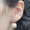 Boucles d'oreilles Boucles d’oreilles corail et diamants en or blanc 18 carats 58 Facettes T311
