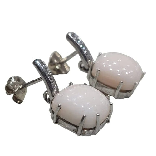 Boucles d'oreilles Boucles d’oreilles corail et diamants en or blanc 18 carats 58 Facettes T311