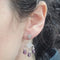 Boucles d'oreilles Boucles d’oreilles briolette en or blanc 18 carats, améthystes et diamants 58 Facettes PE197