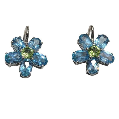 Boucles d'oreilles Boucles d'oreilles en or blanc 18 carats avec topaze bleue et péridot 58 Facettes PE802