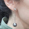 Boucles d'oreilles Boucles d’oreilles en or blanc 18 carats, perles de Tahiti et diamants 58 Facettes T016PE754