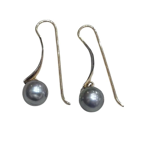 Boucles d'oreilles Boucles d’oreilles en perles de Tahiti en or jaune 18 carats 58 Facettes T135