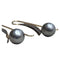 Boucles d'oreilles Boucles d’oreilles en perles de Tahiti en or jaune 18 carats 58 Facettes T135