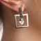 Boucles d'oreilles Boucles d'oreilles en or blanc 18 carats avec aigue-marine et tsavorites 58 Facettes T472