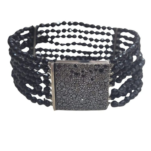 Bracelet Bracelet en or 18 carats au ruthénium, diamants noirs et onyx 58 Facettes P124
