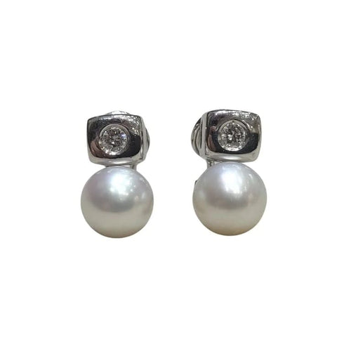 Boucles d'oreilles Boucles d’oreilles en or blanc 18 carats, perles et diamants 58 Facettes T102