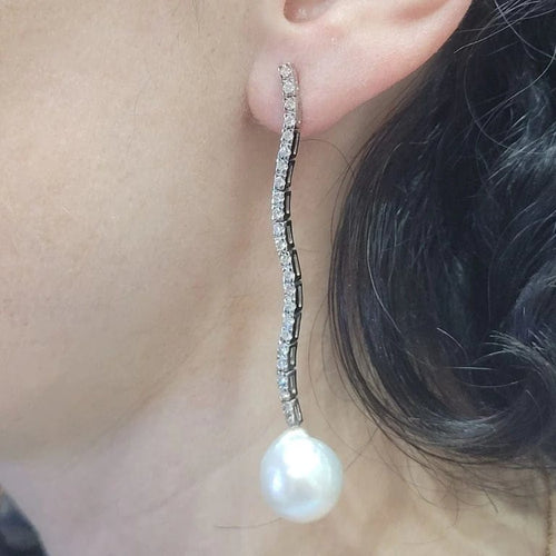 Boucles d'oreilles Boucles d'oreilles longues en diamants et perles 58 Facettes PE403
