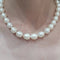 Collier Collier de perles ovales avec fermoir en or jaune 18 carats 58 Facettes COP40