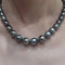 Collier Collier de perles de Tahiti avec fermoir en or blanc 18 carats 58 Facettes COP113