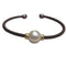 Bracelet Bracelet en acier brun avec perle dorée australienne et or jaune 18 carats 58 Facettes PUV208
