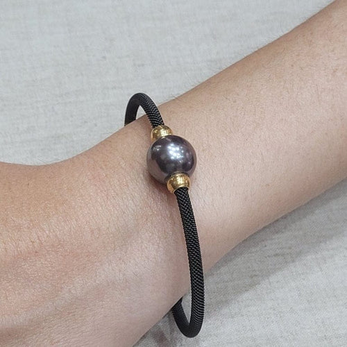 Bracelet Bracelet en perle de Tahiti en acier noir et or jaune 18 carats 58 Facettes PUV210