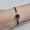 Bracelet Bracelet en or jaune 18 carats et grenat 58 Facettes P176
