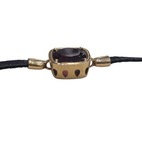 Bracelet Bracelet en or jaune 18 carats et grenat 58 Facettes P176