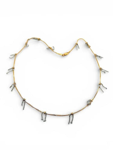 Collier Collier maille gourmette en or bicolore 18 carats 58 Facettes