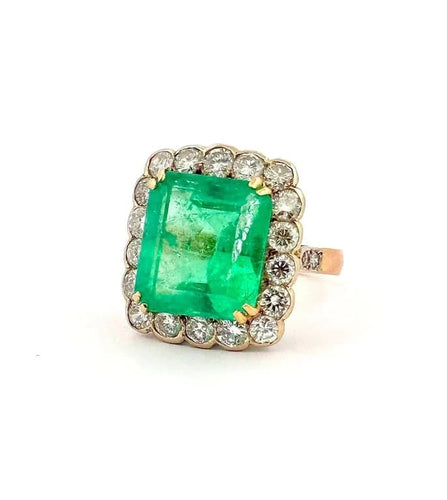 Bague 53 Bague en or jaune 18 carats, émeraude et diamants 58 Facettes