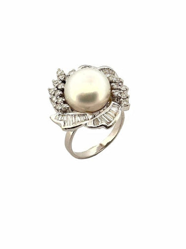 Bague 58 Bague en or blanc 18 carats avec perle et diamants 58 Facettes