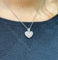 Pendentif Pendentif cœur en or blanc 18 carats et diamants 58 Facettes