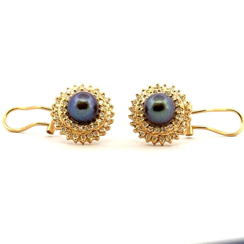 Boucles d'oreilles Boucles d’oreilles en or 18 carats avec diamants et perles de Tahiti 58 Facettes