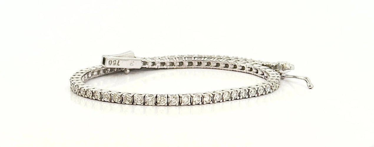 Bracelet Bracelet tennis rivière en or blanc 18 carats et diamants 58 Facettes