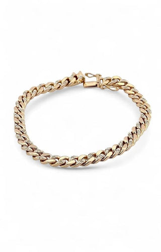 Bracelet Gourmette en or jaune 14 carats sertie de diamants 58 Facettes