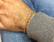 Bracelet Gourmette en or jaune 14 carats sertie de diamants 58 Facettes