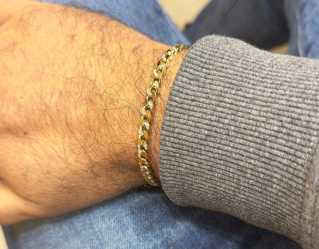 Bracelet Gourmette en or jaune 14 carats sertie de diamants 58 Facettes