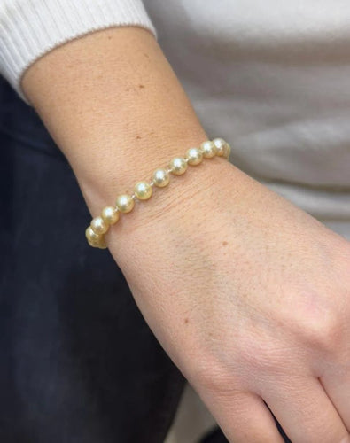 Bracelet Bracelet perles de culture blanches avec fermoir en or jaune 18 carats 58 Facettes