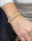 Bracelet Bracelet perles de culture blanches avec fermoir en or jaune 18 carats 58 Facettes