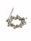 Broche Broche ancienne cyclone en or blanc 18 carats et diamants 58 Facettes