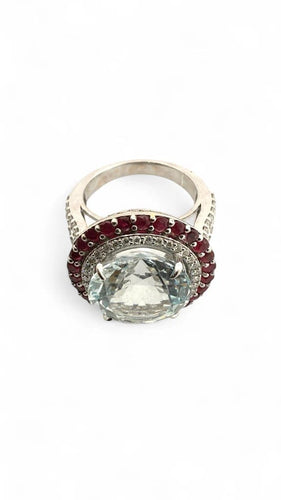 Bague 55 Bague en or blanc, aigue-marine, diamants et rubis 58 Facettes