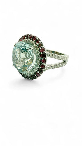 Bague 55 Bague en or blanc, aigue-marine, diamants et rubis 58 Facettes