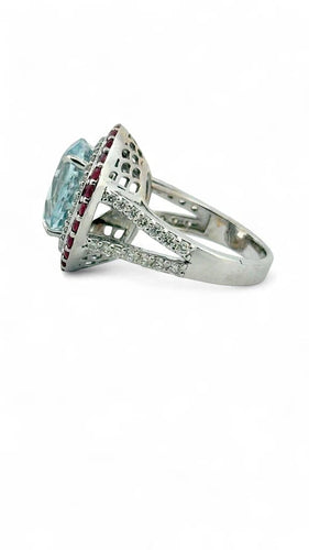 Bague 55 Bague en or blanc, aigue-marine, diamants et rubis 58 Facettes
