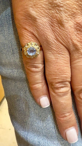 Bague 48 Bague marguerite ancienne en or rose 18 carats, aigue-marine et diamants 58 Facettes