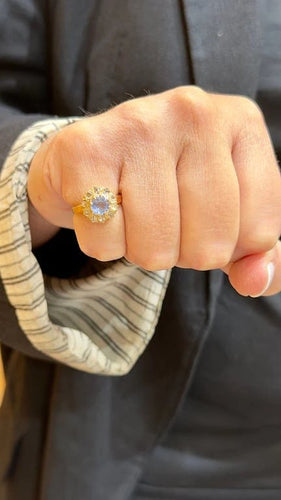 Bague 48 Bague marguerite ancienne en or rose 18 carats, aigue-marine et diamants 58 Facettes