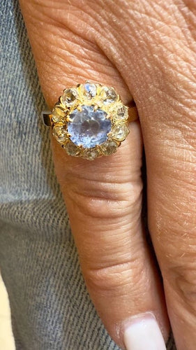 Bague 48 Bague marguerite ancienne en or rose 18 carats, aigue-marine et diamants 58 Facettes