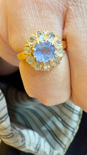 Bague 48 Bague marguerite ancienne en or rose 18 carats, aigue-marine et diamants 58 Facettes