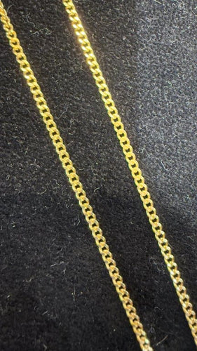 Collier Chaîne maille gourmette en or jaune 18 carats 60 cm 58 Facettes
