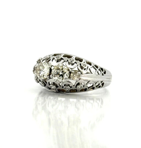 Bague 60 Bague ancienne ajourée en or blanc et diamants 58 Facettes