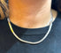 Collier Collier tennis en or blanc 18 carats et diamants 58 Facettes