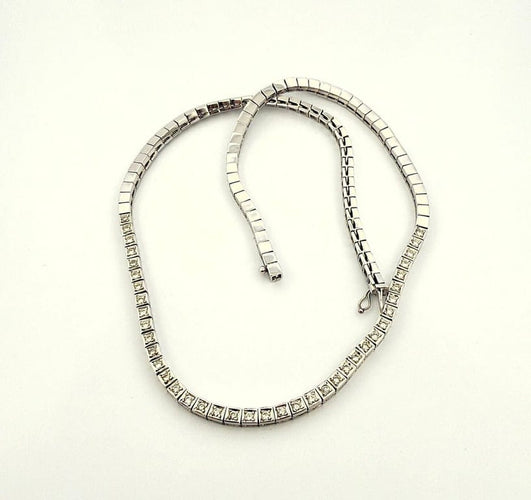 Collier Collier tennis en or blanc 18 carats et diamants 58 Facettes