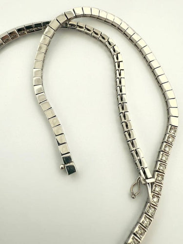 Collier Collier tennis en or blanc 18 carats et diamants 58 Facettes
