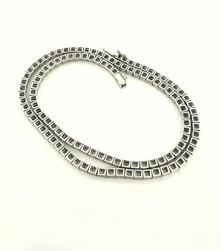 Collier Collier tennis en or blanc 18 carats et diamants 58 Facettes