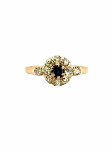 Bague 57 Bague marguerite ancienne en or jaune 18 carats, diamants et saphir 58 Facettes