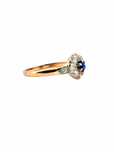 Bague 57 Bague marguerite ancienne en or jaune 18 carats, diamants et saphir 58 Facettes