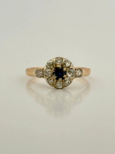 Bague 57 Bague marguerite ancienne en or jaune 18 carats, diamants et saphir 58 Facettes