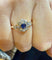 Bague 57 Bague marguerite ancienne en or jaune 18 carats, diamants et saphir 58 Facettes